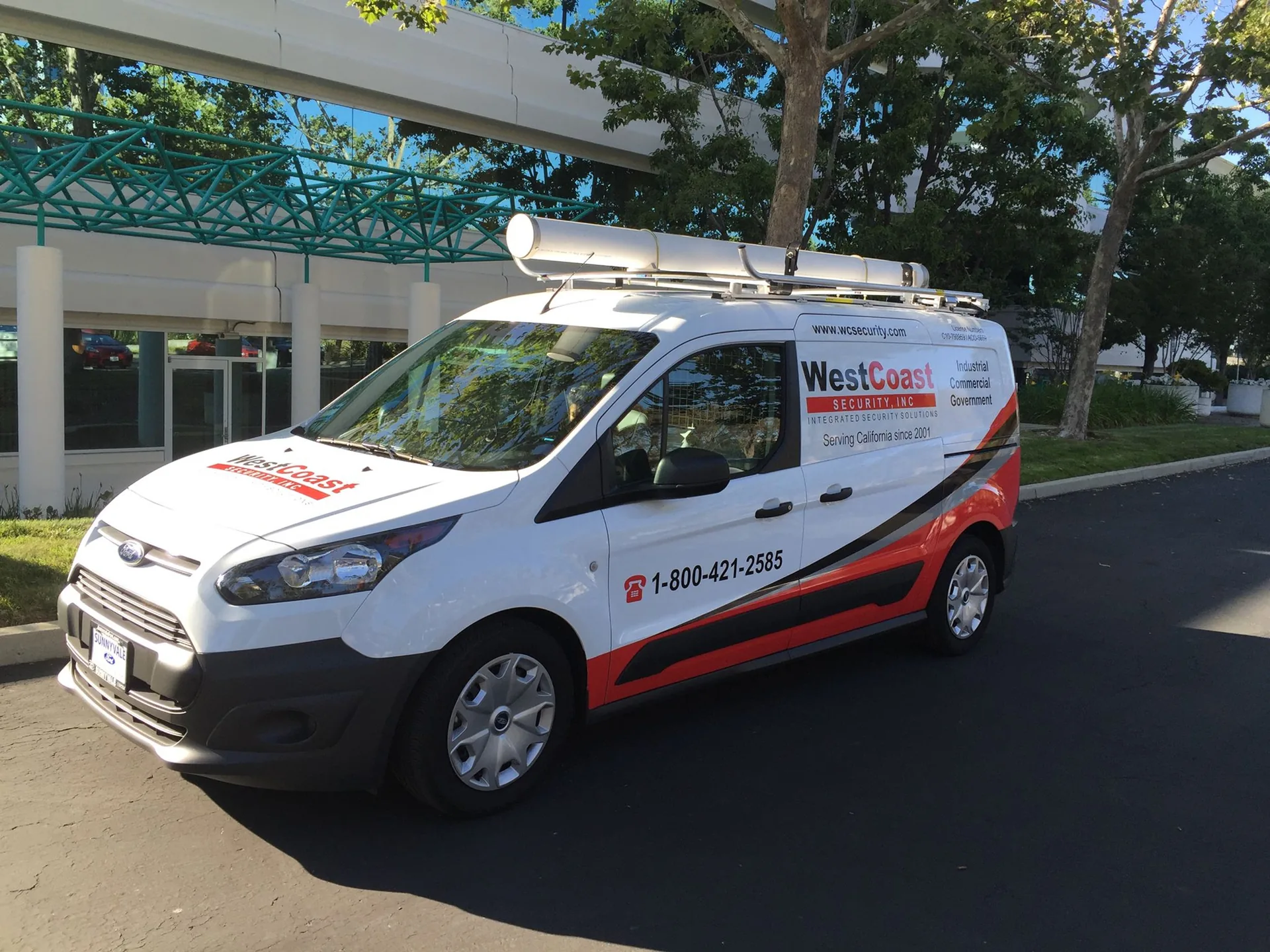 West Coast Security service vehicle at a commercial customer site